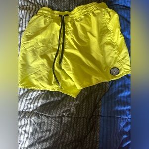 Yellow Volcom shorts.
